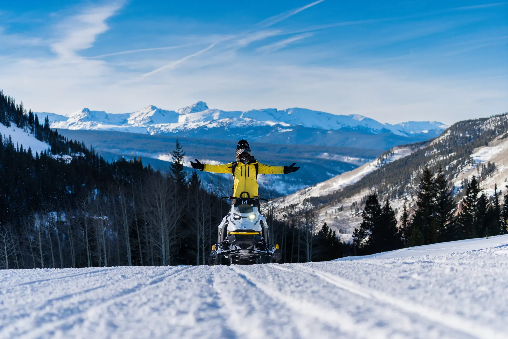 Snowmobiler enjoying guided tour in Beaver Creek Colorado backcountry