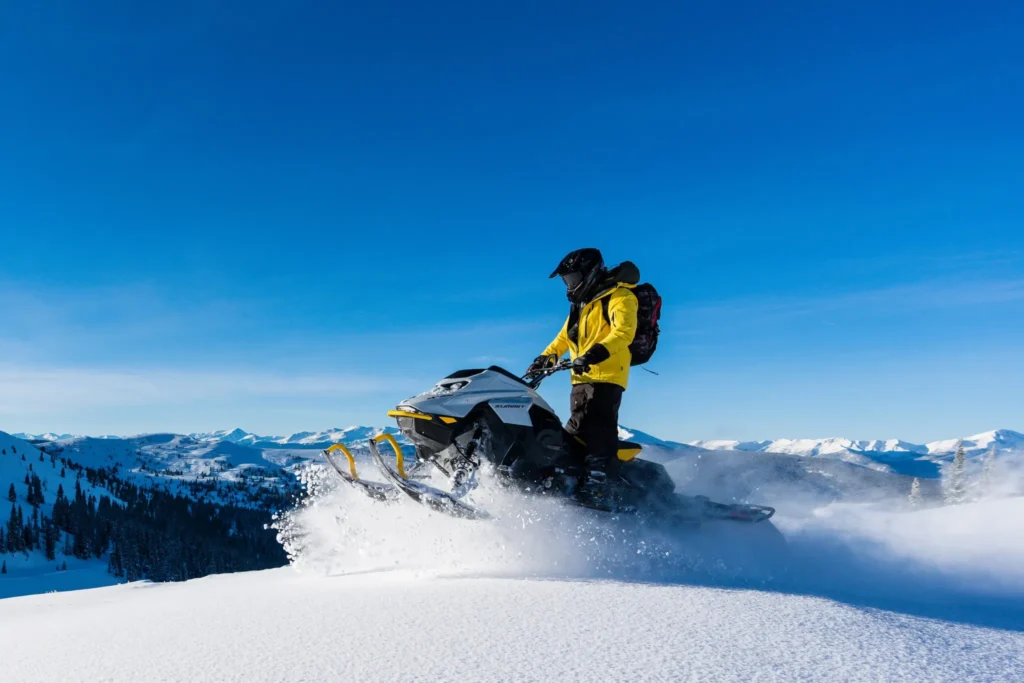 High Performance Beaver Creek snowmobile tour through Rocky Mountain backcountry
